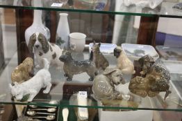 A collection of Copenhagen and Bing & Grondahl dogs.