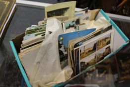 A quantity of postcards.