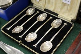 A cased set of six silver seal top coffee spoons.