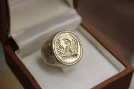 A silver seal ring.