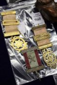 Two silver gilt Masonic medals and another similar.