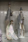 Two unusual Lladro groups depicting elongated figures.