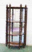A good set of 19th century rosewood and mirror back wall shelves, the shelves united by open