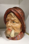 A pottery tobacco jar modelled as a bust of a sailor.