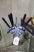 An unusual Dutch porcelain flower basket and a set of six fruit knives.