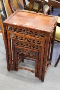 A Chinese nest of hardwood tables.