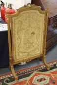 A French gilt framed fire screen.