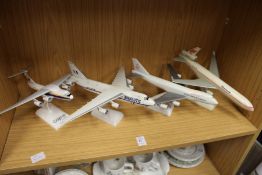 Four model aeroplanes.