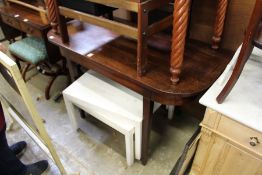 A mahogany side table.