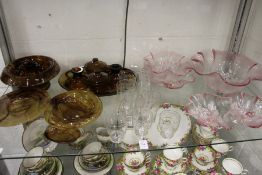 A quantity of decorative glassware to include a smoky brown dressing table set etc.