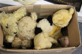 A Merrythought plush Teddy bear and other soft toys.