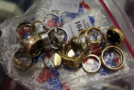 A quantity of dress rings.
