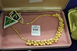 A gilt metal necklace.