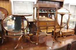 Two dressing table mirrors, two wine tables and a mahogany wash stand.