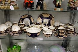 A large quantity of 19th century tea ware, possibly by Rockingham, to include teapot, sucrier,