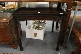 A Chinese square shaped occasional table.