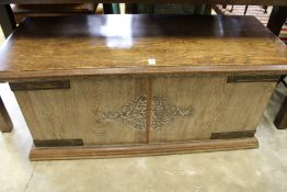 An Arts and Crafts oak storage box.