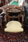 A set of six 19th century mahogany dining chairs with carved cresting rails and tie bars with