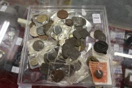 A quantity of coins and tokens etc.