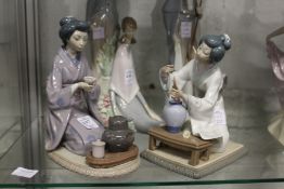 Two Lladro groups depicting seated geishas.