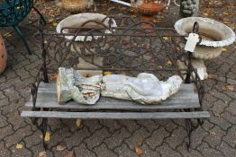 A cast iron garden bench.