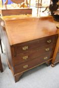 A mahogany bureau.