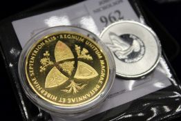 Two commemorative medallions / coins.