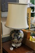 A Chinese pottery table lamp.