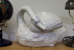 A swan shaped pottery jardiniere.