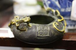 A small Chinese bronze censer with kylin handles.