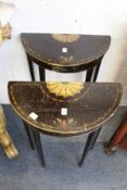 A pair of Edwardian painted demi-lune side tables of small proportion.