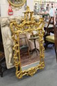 A Chinese Chippendale revival gilt framed pier mirror.