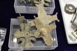 Five large Roman cast metal crosses.