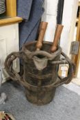 An early leather twin handled bucket.