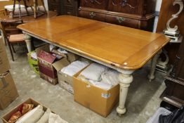 A good large modern pine and painted pine kitchen table, with one extra leaf.