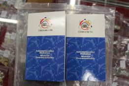Two Euro Tunnel 1994 commemorative medallions.