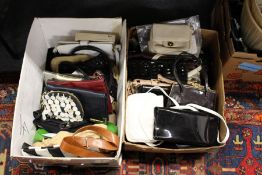 A large quantity of ladies' handbags.