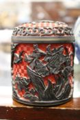 A Chinese cinnabar lacquer circular box and cover.
