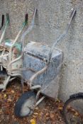 A builder's wheelbarrow.