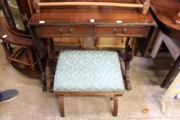 A reproduction sofa table and a stool.