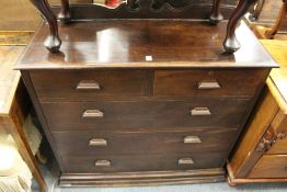 A mahogany chest of drawers.