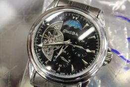 A gent's stainless steel wristwatch.