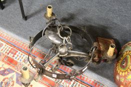 A wrought iron chandelier.