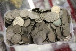 A large quantity of sixpences.