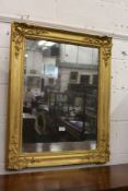 An early gilt framed mirror.