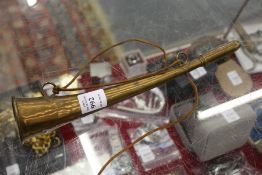 A copper hunting horn.