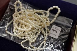 Pearl necklaces.