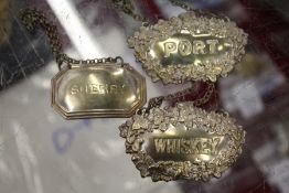 Three decanter labels.