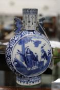 A good small 19th century Chinese blue and white porcelain moon flask. Height 17cm (6.75in)