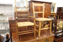 A child's rush seated armchair and a child's elm seated chair.
